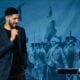 Turkish and American former basketball player Enes Kanter Freedom speaks onstage at an Americans for Prosperity event at the Adventureland amusement park on August 22, 2026 in Altoona, Iowa.