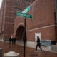 A runner jogs past the John Joseph Moakley United States Courthouse January 4, 2015 in Boston, Massachusetts.
