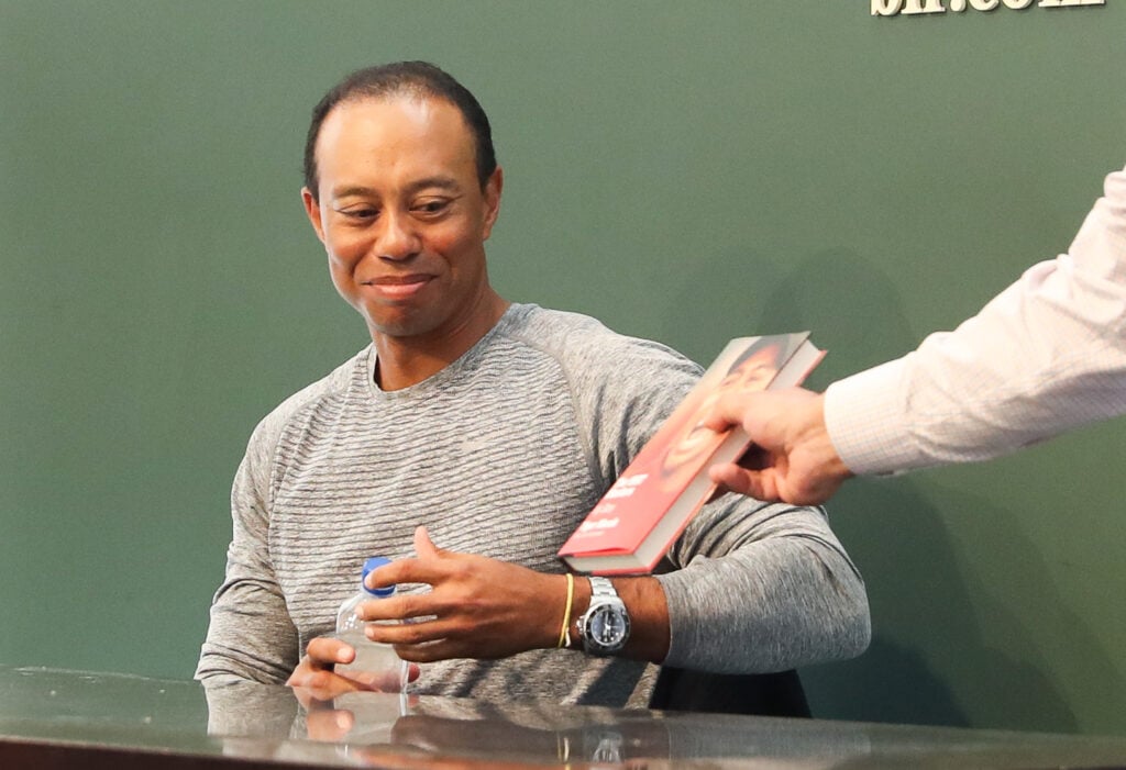 Tiger Woods signs copies of his new book, "The 1997 Masters: My Story" at Barnes & Noble Union Square on March 20, 2017 in New York City.  