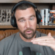 Travis Kelce displays his wedding ring on the 'New Heights' podcast.