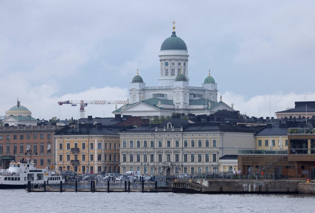 Helsinki cathedral looms over Helsinki harbor.