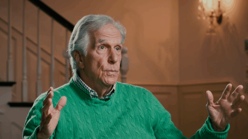 Henry Winkler gestures while explaining.