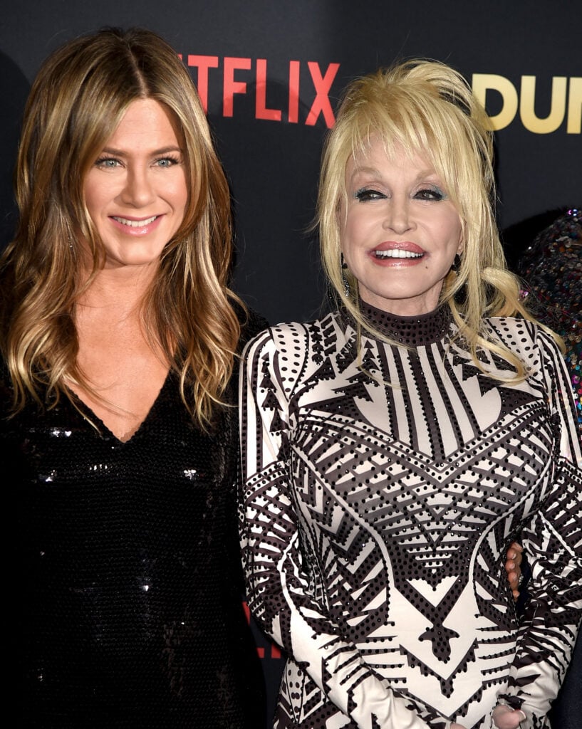 Jennifer Aniston and Dolly Parton in December 2018.