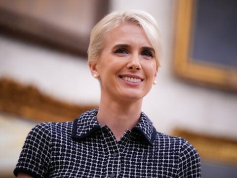 Executive assistant to U.S. President Donald Trump Natalie Harp looks on as U.S. President Donald Trump speaks during an agriculture event in the Oval Office of the White House on September 04, 2026 in Washington, DC.