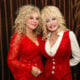 Stella Parton and Dolly Parton attend Stella Parton's Red Tent Women's Conference 2014 at the Doubletree Hotel Downtown on April 18, 2014 in Nashville, Tennessee.