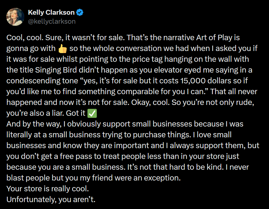A dark mode screenshot of Kelly Clarkson's retaliatory tweet about Art of Play on October 11, 2026.