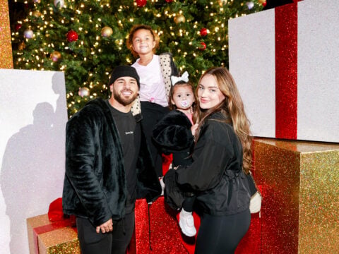 Cory Wharton, Ryder Wharton, Mila Wharton, and Taylor Wharton attend the Dodgers Holiday Festival at Dodger Stadium on December 01, 2021 in Los Angeles, California.