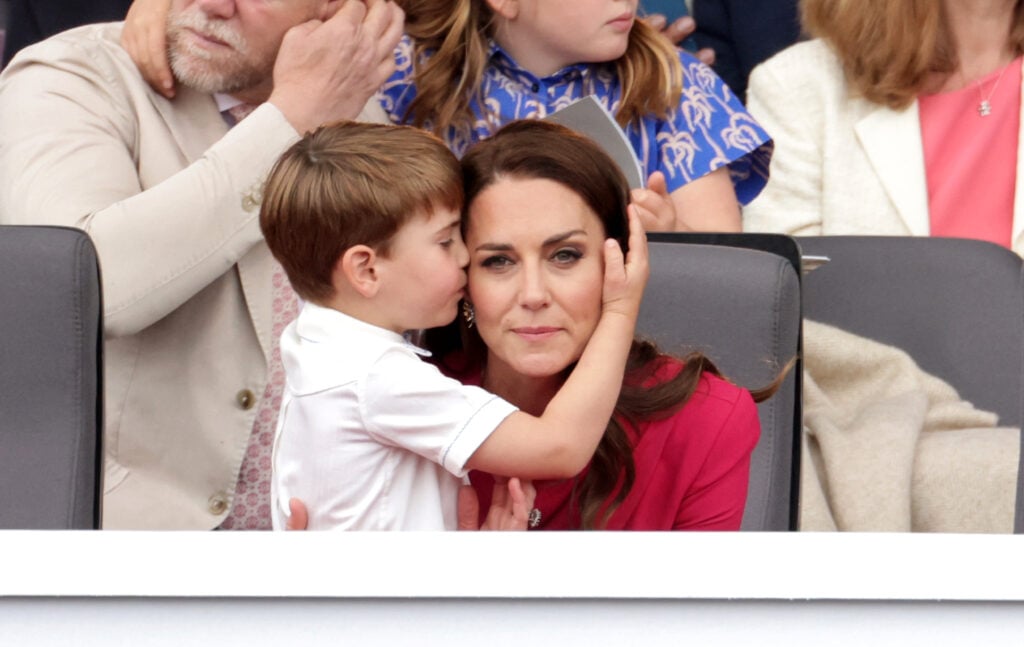 Catherine, Duchess of Cambridge hugs Prince Louis of Cambridge during the Platinum Pageant on June 05, 2022 in London, England.