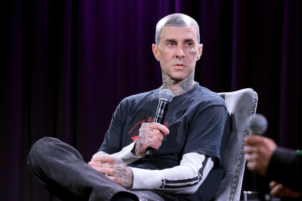 Travis Barker speaks onstage at A Conversation With Travis Barker at GRAMMY Museum L.A. Live on October 16, 2024 in Los Angeles, California.  