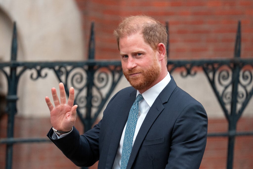 Prince Harry, Duke of Sussex waves as he leaves the High Court on April 8, 2025 in London, England. Prince Harry arrived in the UK this morning to attend court for his appeal against the downgrading of his security detail for family visits to the UK. 