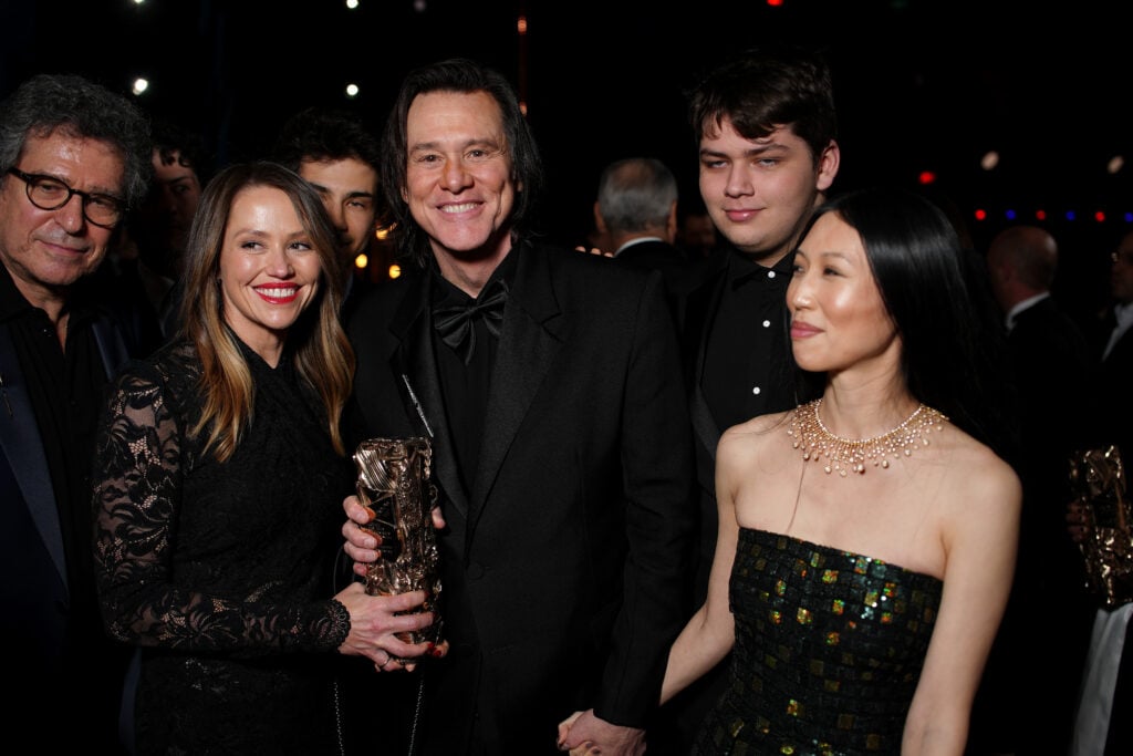 Jane Erin Carrey, Jim Carrey, Min Ah and Jackson Riley pose during the 51st Cesar Film Awards at L'Olympia on February 26, 2026 in Paris, France. 