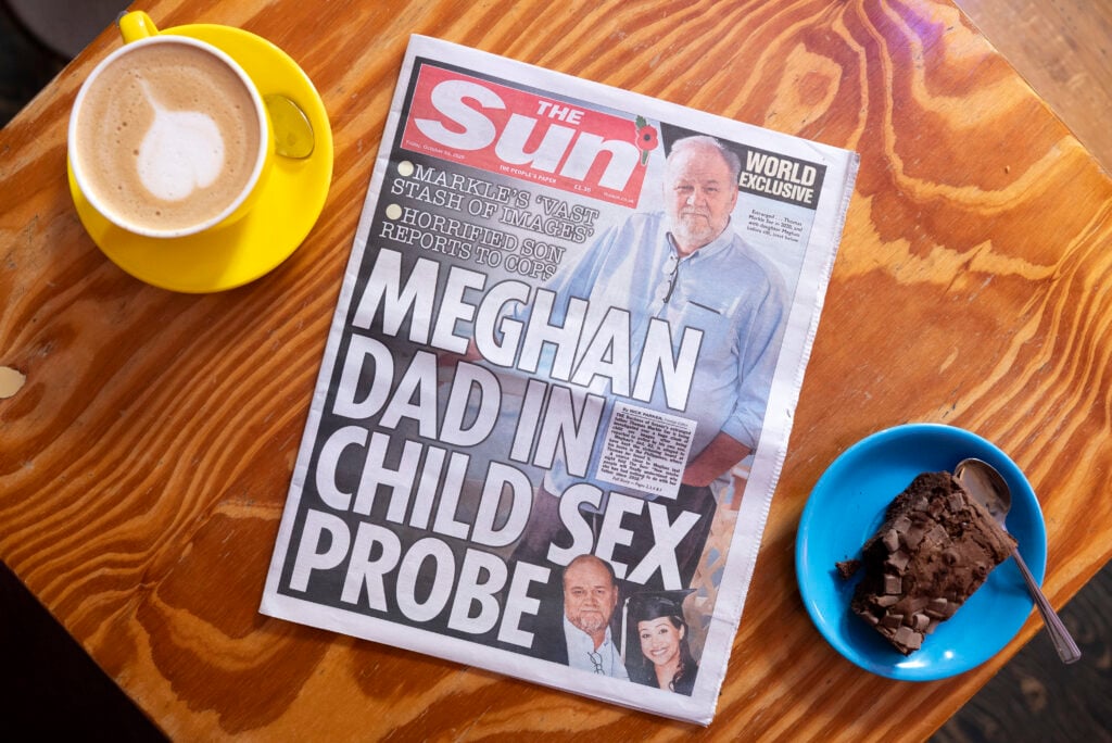 In this illustration, the front page of The Sun newspaper reports allegations against Thomas Markle on October 24, 2026 in London, England. 